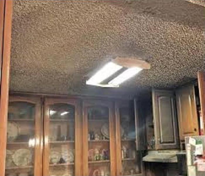 Smoke and soot in a kitchen from a fire